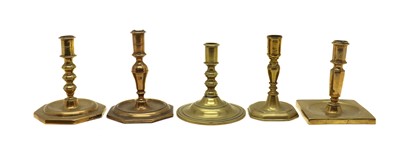 Lot 350 - Five brass candlesticks