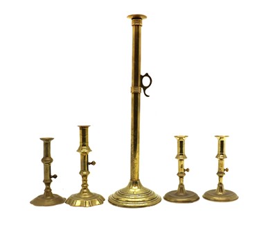 Lot 347 - A tall brass candlestick