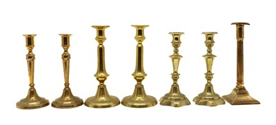 Lot 343 - Three pairs of brass candlesticks
