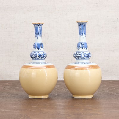 Lot 212 - A pair of Chinese blue and white double gourd vases