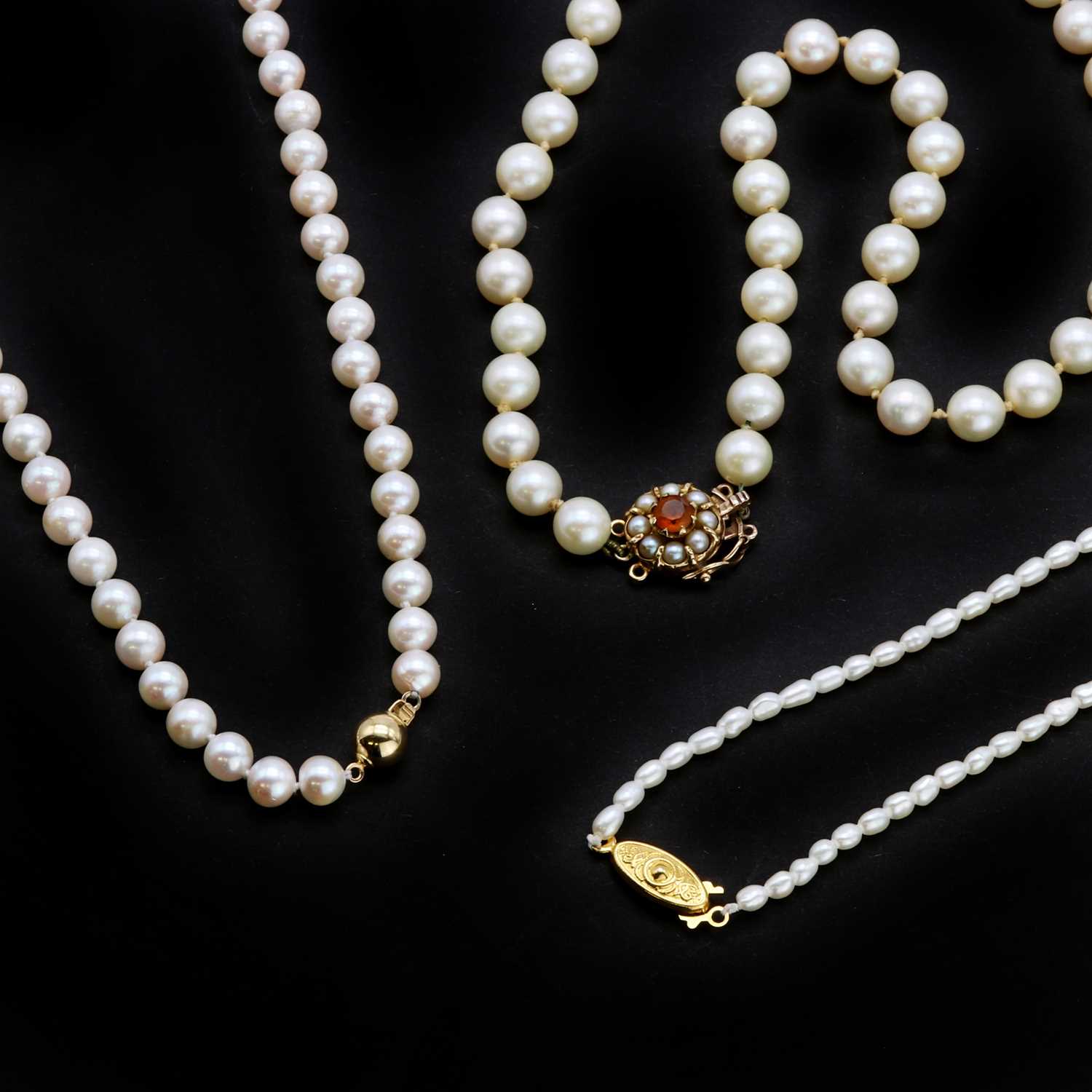 Lot 166 Three cultured pearl necklaces,