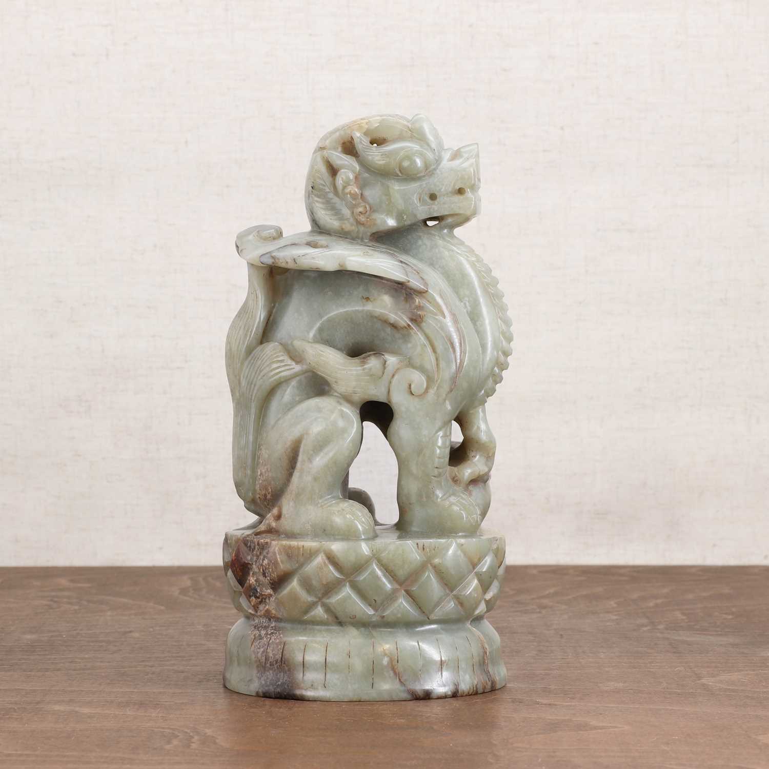 Lot 323 - A Chinese jade carving