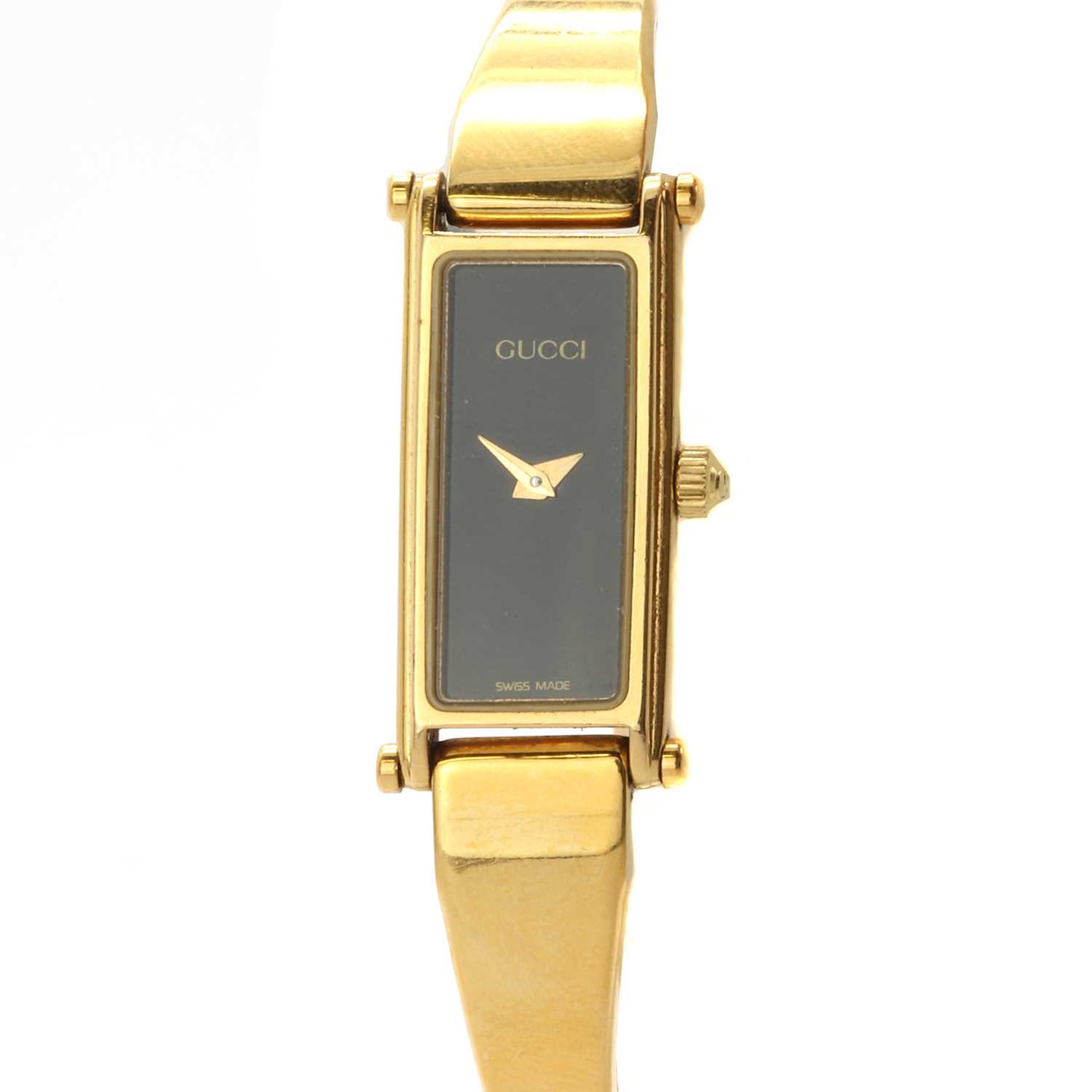 Lot 236 - A ladies' gold plated Gucci quartz bangle watch