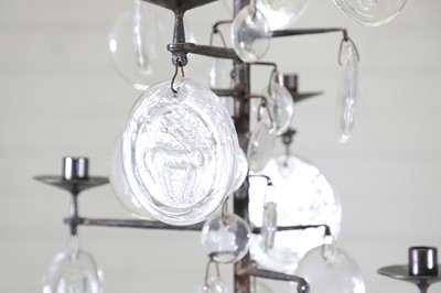 Lot 476 - A Swedish iron and glass 'Model 341' chandelier