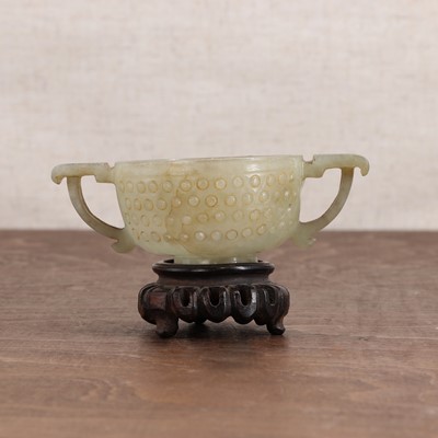 Lot 192 - A Chinese jade two-handled cup