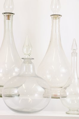 Lot 519 - A near pair of large glass chemists' bottles