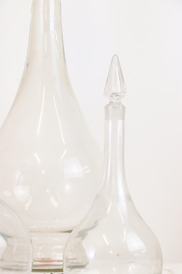 Lot 519 - A near pair of large glass chemists' bottles