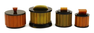 Lot 333 - Four Art Deco bakelite jars and covers