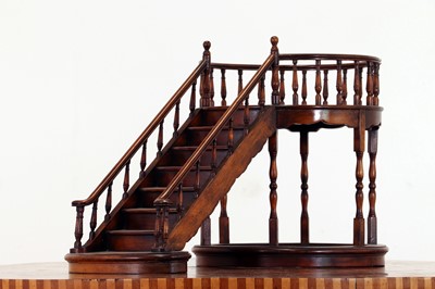 Lot 24 - A turned wooden architectural model of a staircase