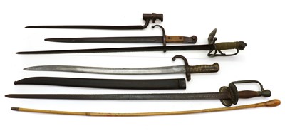 Lot 113 - A group of five swords and bayonets