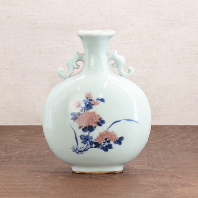 Lot 144 - A Chinese copper-red and underglaze-blue moon flask