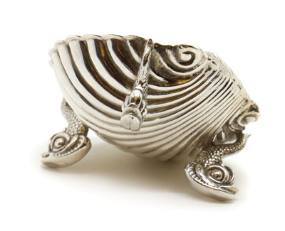 Lot 10 - A set of four silver shell salts