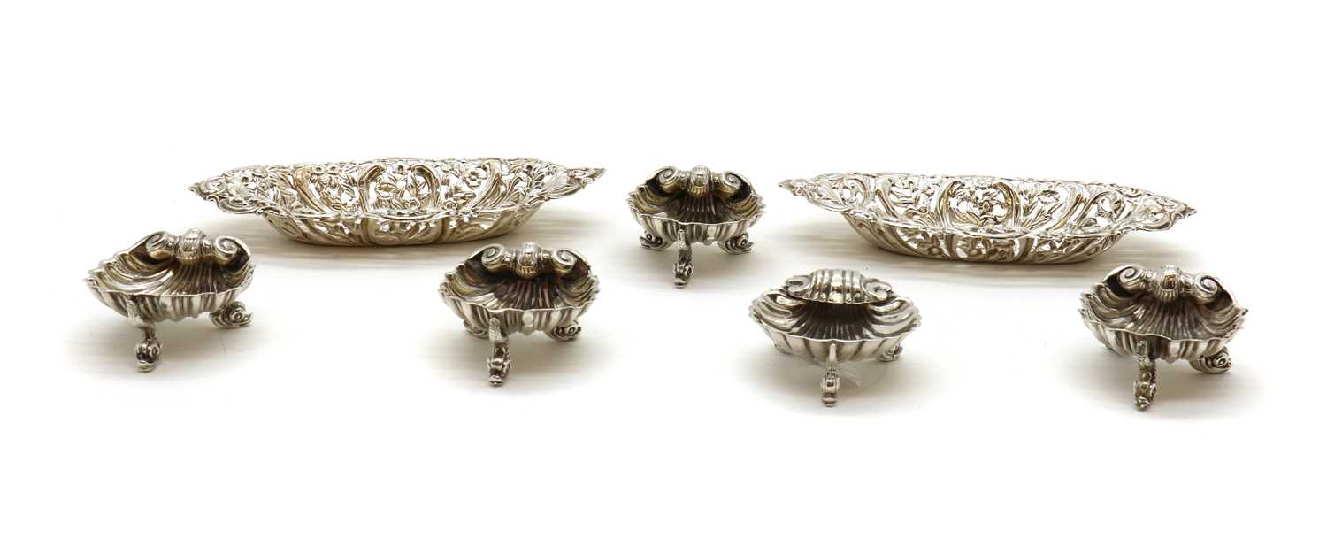 Lot 10 - A set of four silver shell salts