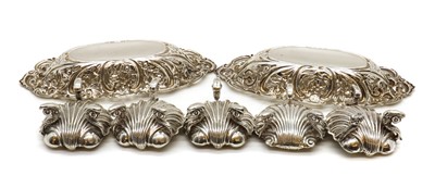 Lot 10 - A set of four silver shell salts