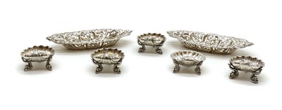 Lot 10 - A set of four silver shell salts