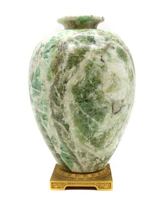 Lot 313 - A specimen stone gilt-metal mounted vase