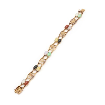 Lot 146 - A vari-colour jade panel bracelet