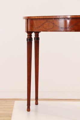 Lot 526 - A satinwood demilune pier table