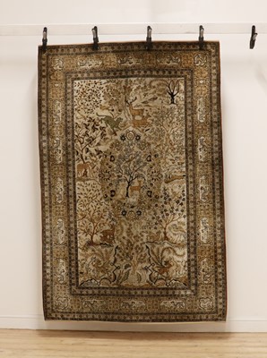Lot 371 - A Persian silk rug
