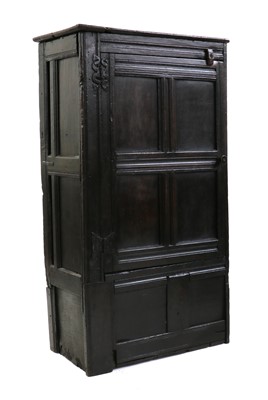 Lot 447 - An oak wainscot cupboard