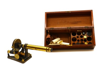 Lot 259 - A cased Victorian brass microscope