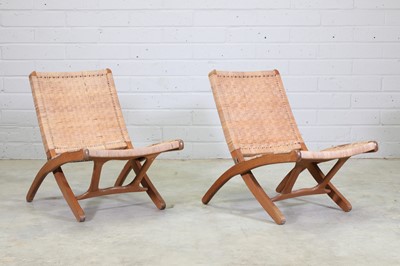 Lot 345 - A pair of Danish oak and cane folding chairs