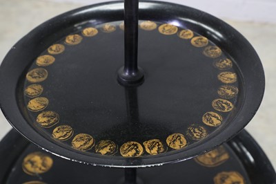 Lot 313 - An Italian lithographed three-tier table