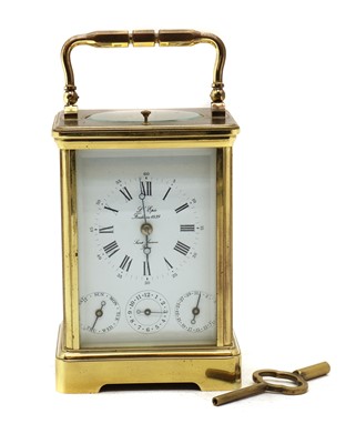 Lot 303 - A brass carriage clock