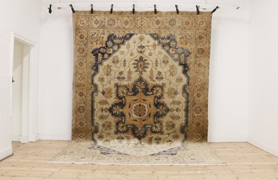 Lot 380 - A Heriz carpet