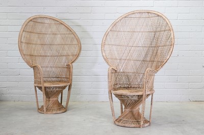 Lot 310 - A pair of cane peacock chairs