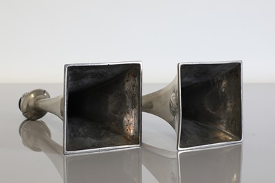Lot 119 - A pair of WMF Secessionist pewter candlesticks