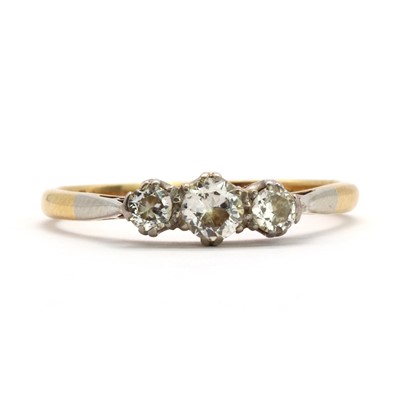 Lot 49 - A gold three stone diamond ring