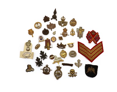 Lot 143 - A collection of regimental military cap badges