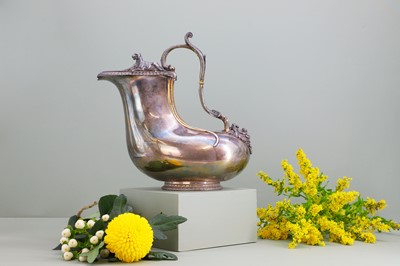 Lot 125 - A Victorian silver and silver-gilt askos jug