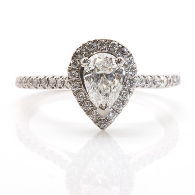 Lot 374 - A pear shaped diamond halo cluster ring