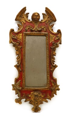 Lot 387 - A Baroque style parcel gilt mirror