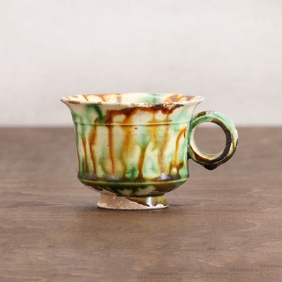 Lot 19 - A Chinese sancai-glazed cup