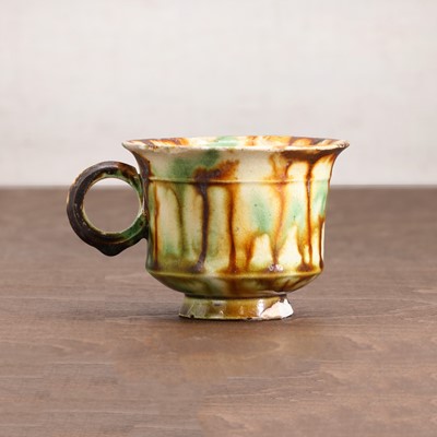 Lot 19 - A Chinese sancai-glazed cup