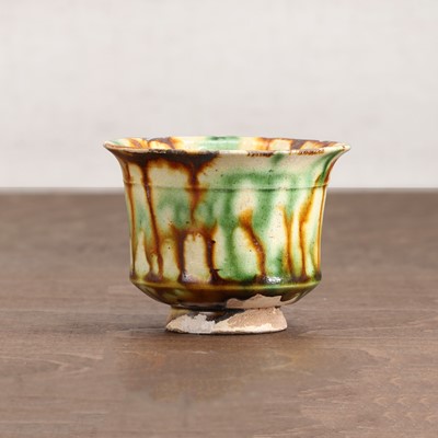 Lot 19 - A Chinese sancai-glazed cup