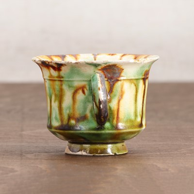 Lot 19 - A Chinese sancai-glazed cup