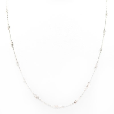 Lot 119 - A Belle Epoch style diamond set long chain