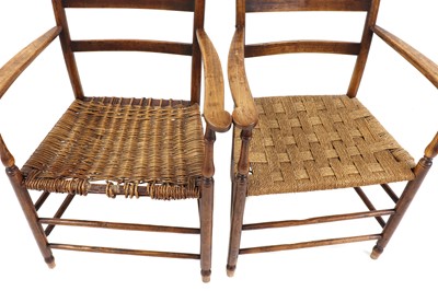 Lot 427 - A pair of American cedar and elm elbow chairs
