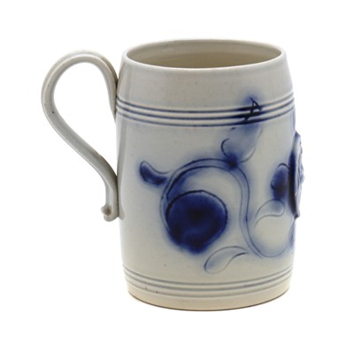 Lot 244 - A Staffordshire stoneware mug