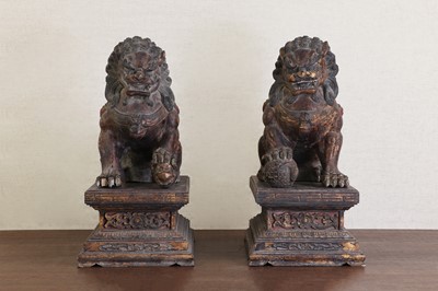 Lot 253 - A pair of Chinese gilt-lacquered wood carvings