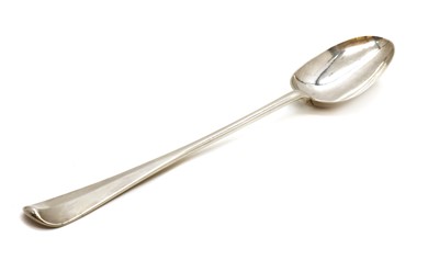 Lot 23 - A George I Britannia silver basting spoon