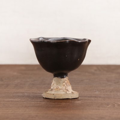 Lot 17 - A Chinese stoneware stem cup