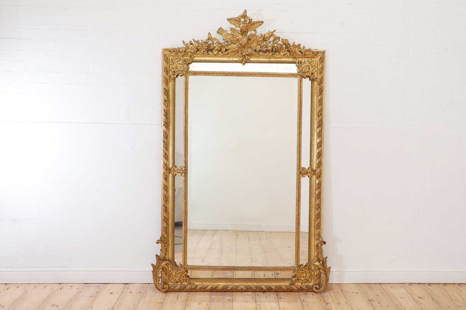 Lot 79 - A Louis XVI-style giltwood and gesso overmantel mirror