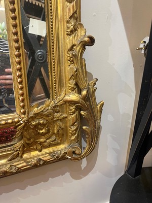 Lot 79 - A Louis XVI-style giltwood and gesso overmantel mirror