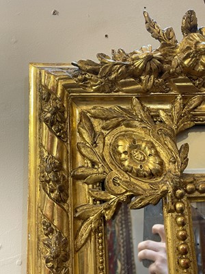 Lot 79 - A Louis XVI-style giltwood and gesso overmantel mirror