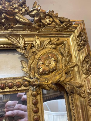 Lot 79 - A Louis XVI-style giltwood and gesso overmantel mirror